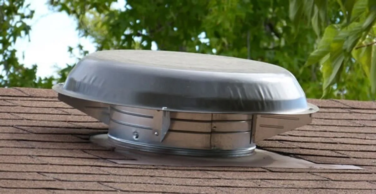 attic fan installation services with low-profile roof ventilation unit in Austin, TX