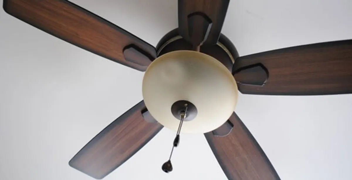 Fully installed ceiling fan with balanced blades and light fixture in Austin, TX
