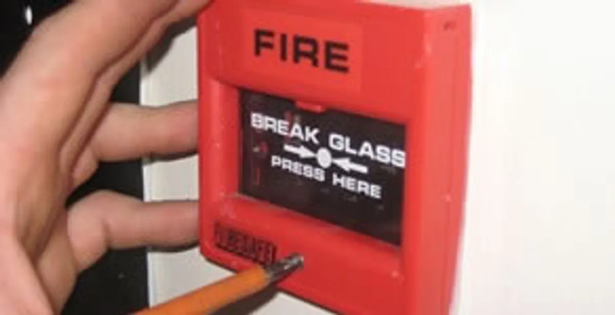 fire alarm installation service showing manual fire alarm pull station installed by licensed electricians in Austin, TX