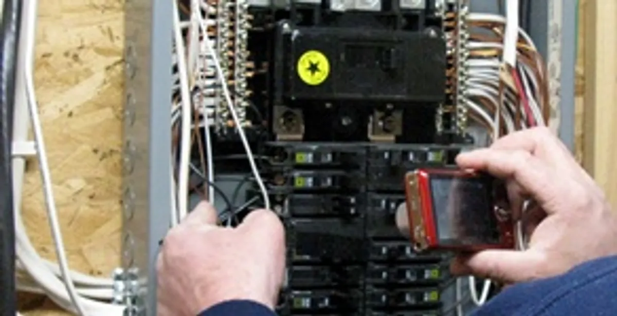 Home electrical inspection of circuit breaker panel by licensed electrician in Austin, TX