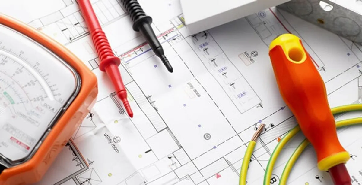 licensed electrician planning and testing electrical systems using professional tools in Austin, TX