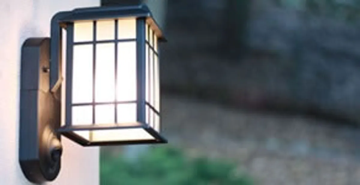 security light installation services with professionally mounted exterior wall light in Austin, TX