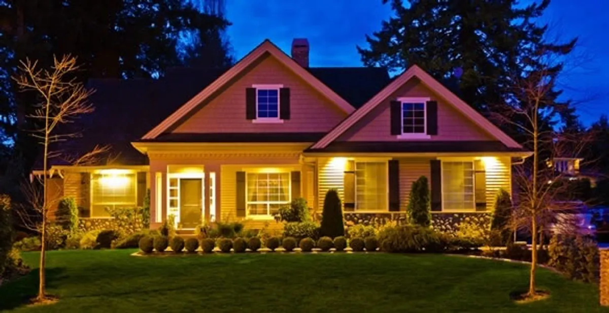 security light installation services illuminating a residential exterior at night in Austin, TX