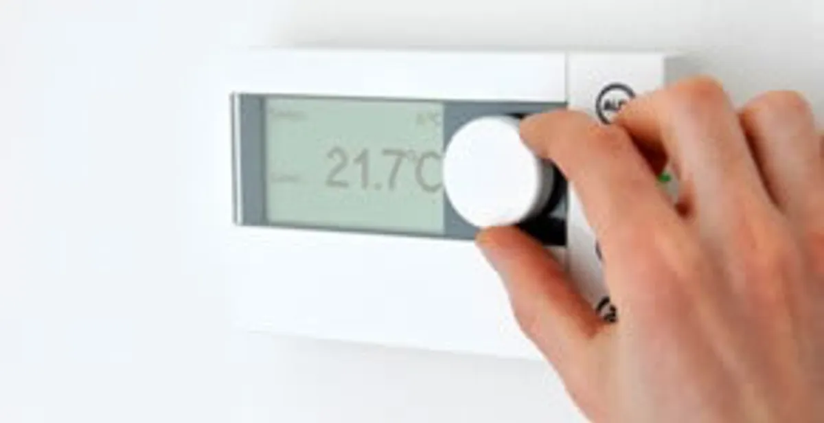 Thermostat installation service with professional adjusting temperature control in Austin, TX