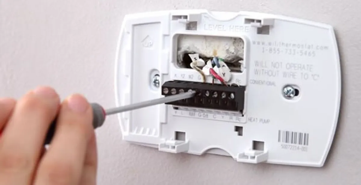 Thermostat installation service with proper wiring and secure wall mounting in Austin, TX