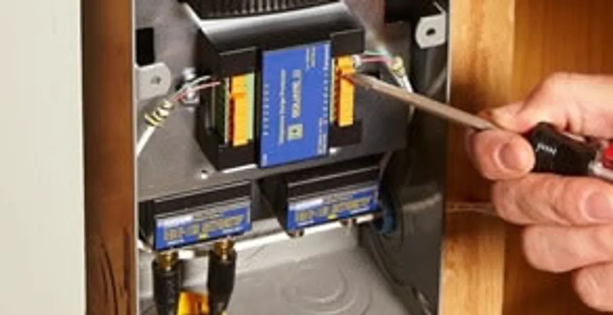 Whole home surge protection device being installed by a licensed electrician to protect electrical systems in Austin, TX